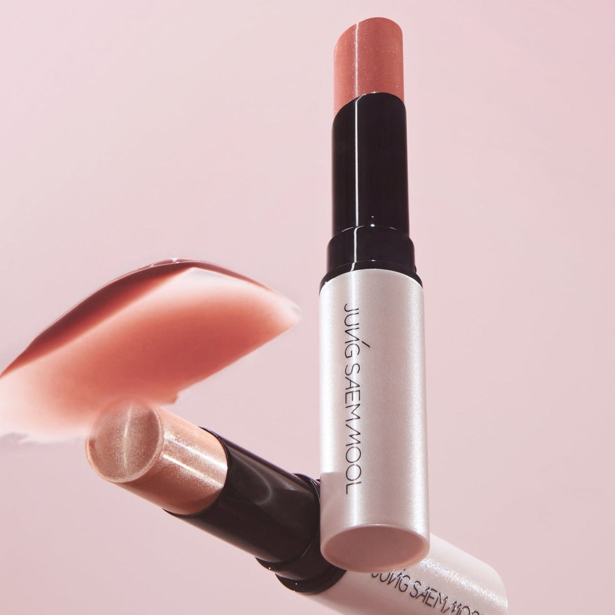 AgelessBeauty3000.com  JUNGSAEMMOOL| LIP-PRESSION Glow Lip Balm  Lipstick with visible brand name on a pink background