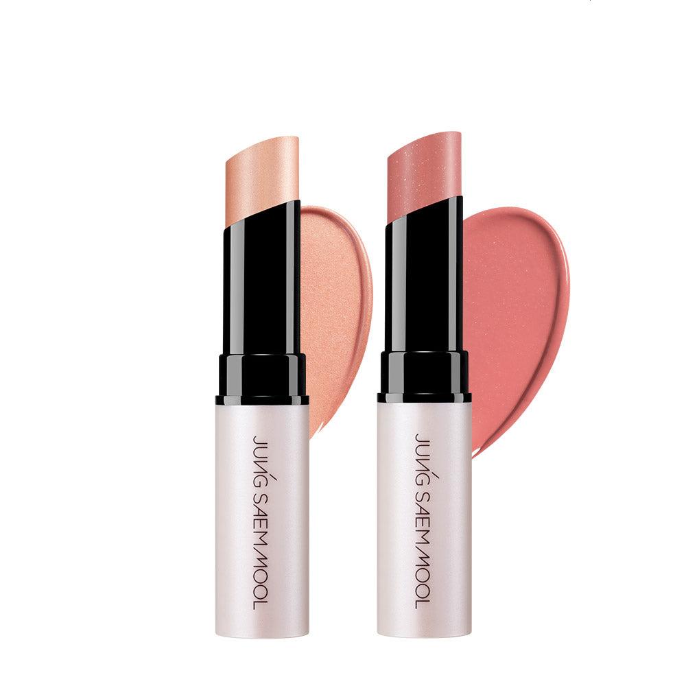 AgelessBeauty3000.com  JUNGSAEMMOOL| LIP-PRESSION Glow Lip Balm   Two cosmetic sticks with pink blushes and black caps on a white background, featuring the brand 'Jung Saemmul'.