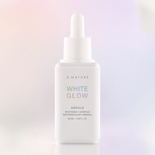 AgelessBeauty3000.com  S.NATURE | White Glow Ampoule  White skincare ampoule bottle labeled 'White Glow' on a light gradient background