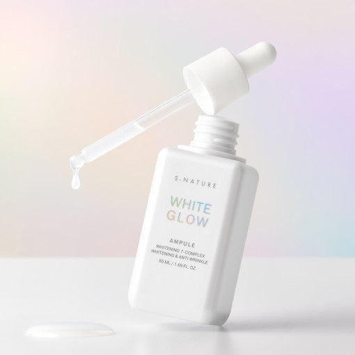 AgelessBeauty3000.com  S.NATURE | White Glow Ampoule  White bottle of S.Nature White Glow Ampule with dropper on a gradient background