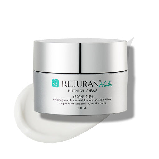 AgelessBeauty3000.com  Rejuvenate Nutritive Cream jar with silver lid on a white background