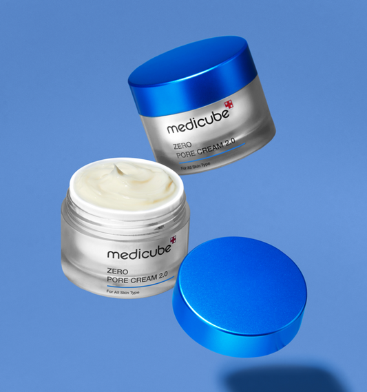 AgelessBeauty3000.com  medicube | Zero Pore Cream 2.0  Two jars of Medicube Zero Pore Cream 2.0 on a blue background