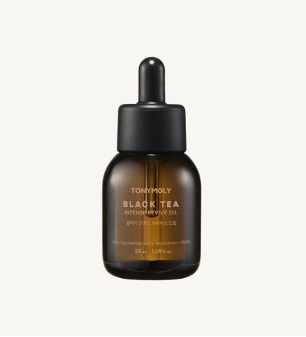 AgelessBeauty3000.com  Tony Moly Black Tea Intensive Revive Oil bottle on a white background