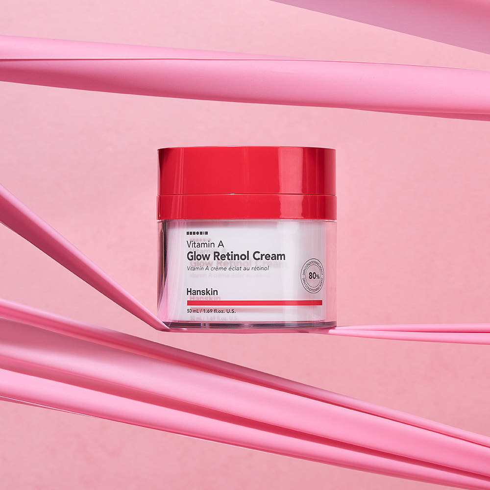 AgelessBeauty3000.com  Red jar of Hanskin Vitamin A Glow Retinol Cream on a pink background