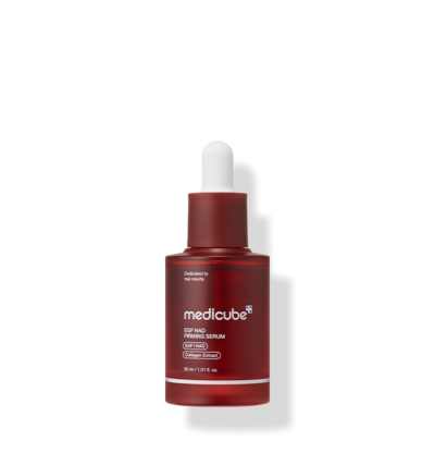 AgelessBeauty3000.com  medicube | EGF NAD Firming Serum    Red serum bottle with dropper on a white background