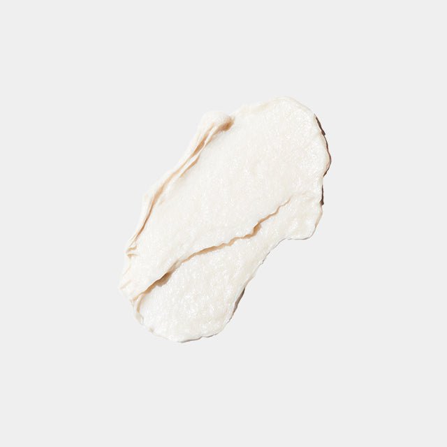 ThatKBeautyShop.com  Sulwhasoo | Ginseng Rejuvenating Cleansing Foam  A thick, creamy off-white cosmetic smear, likely a body butter or cream, shown on a solid light gray background. 